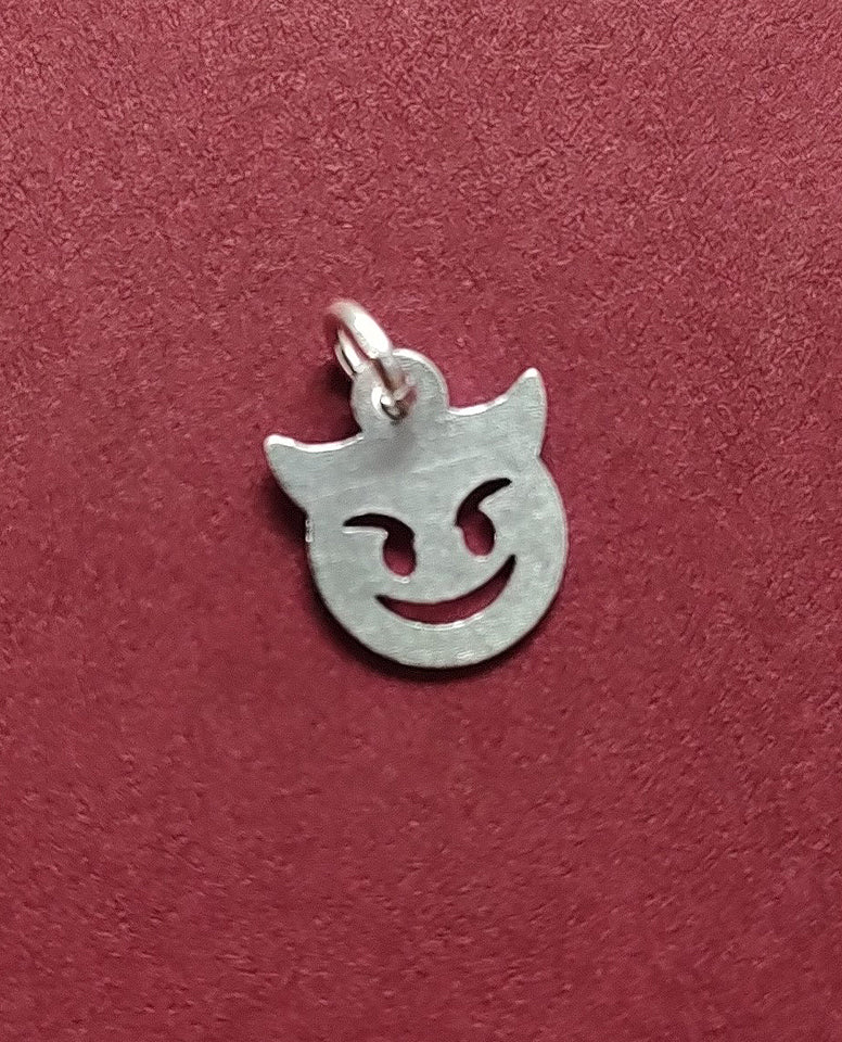 An Unique Devil Face Emoji Charm