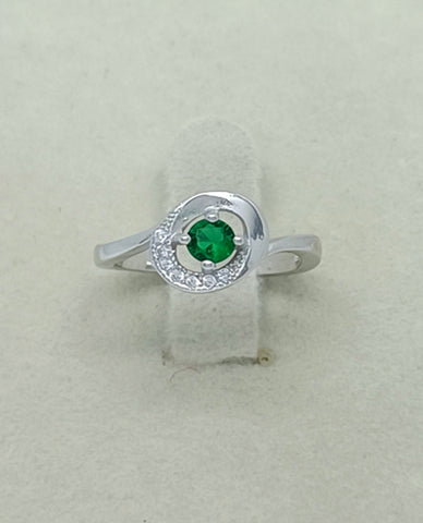 A Beautiful Ring For Trendy Girls in 925 Sterling Silver with Beautiful Cubic Zircon Stones And A Round Cut Pretty Green Stone in Center