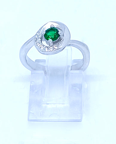 A Beautiful Ring For Trendy Girls in 925 Sterling Silver with Beautiful Cubic Zircon Stones And A Round Cut Pretty Green Stone in Center