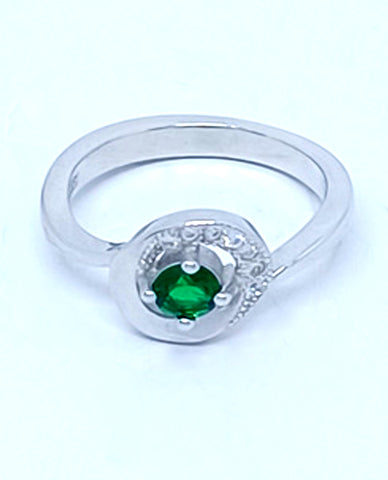 A Beautiful Ring For Trendy Girls in 925 Sterling Silver with Beautiful Cubic Zircon Stones And A Round Cut Pretty Green Stone in Center