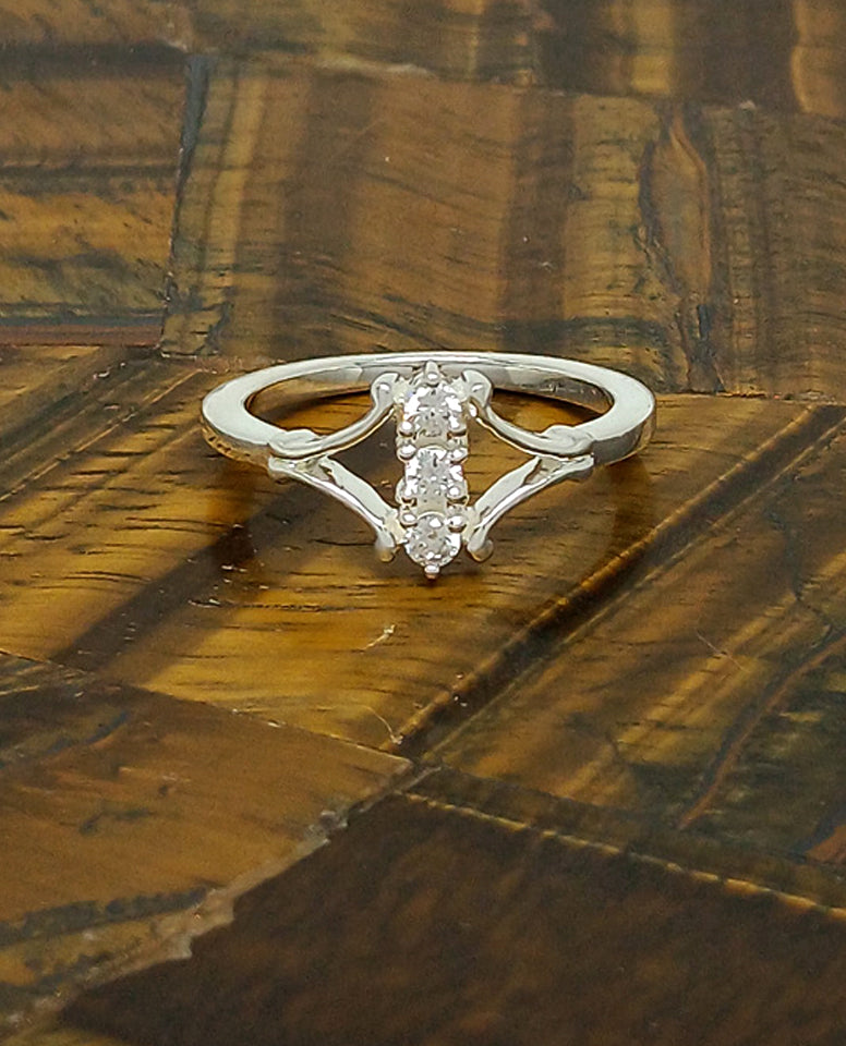 An Alluring Three Stone Ring with Authentic 925 Sterling Silver Rhodium Plated High Polish