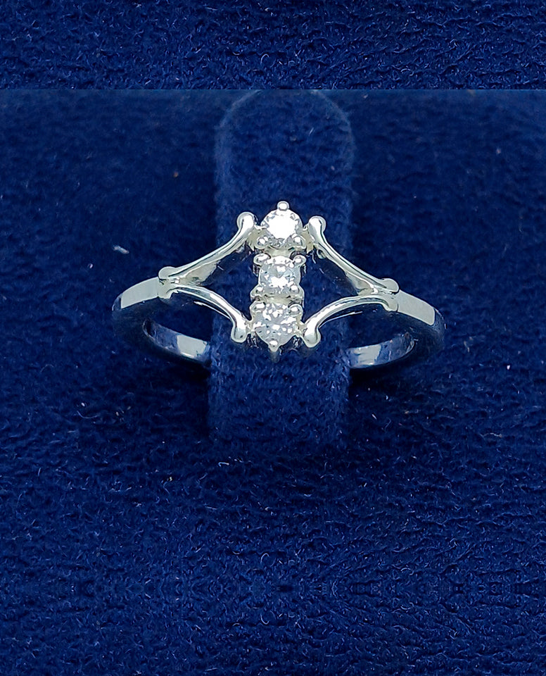 An Alluring Three Stone Ring with Authentic 925 Sterling Silver Rhodium Plated High Polish