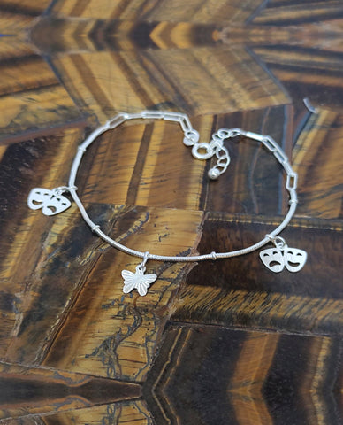 Snake Chain Bracelet With Butterfly and Face Design Charms Crafted in 925 Sterling Silver