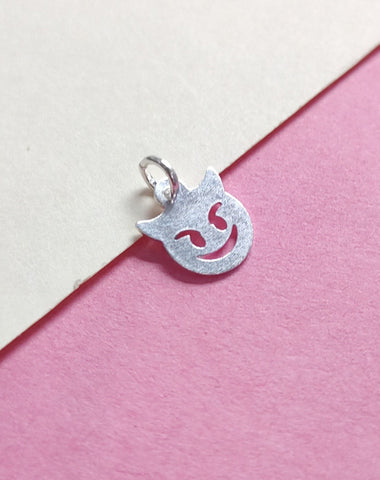 An Unique Devil Face Emoji Charm